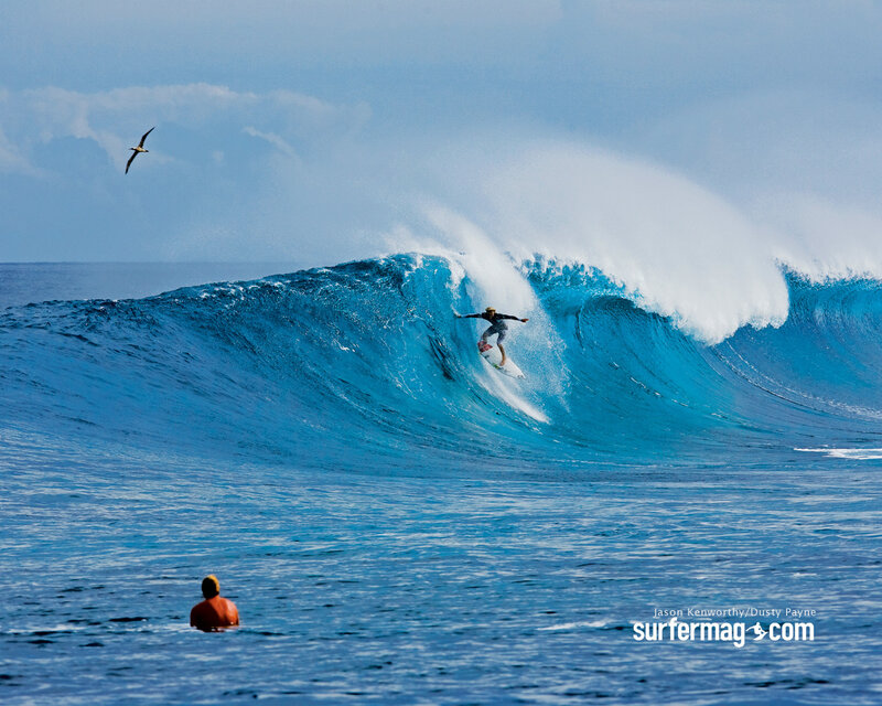 Surfer riding a large wave