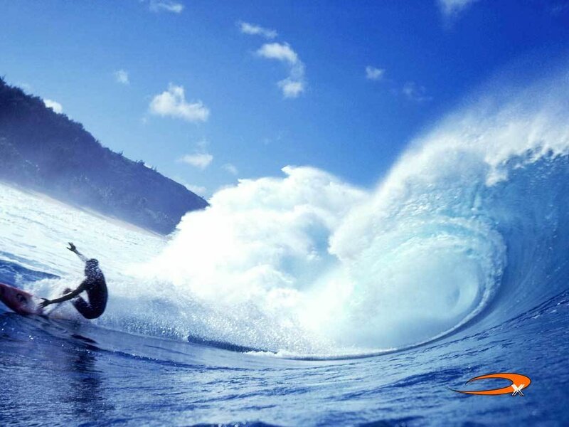 Surfer riding a large wave