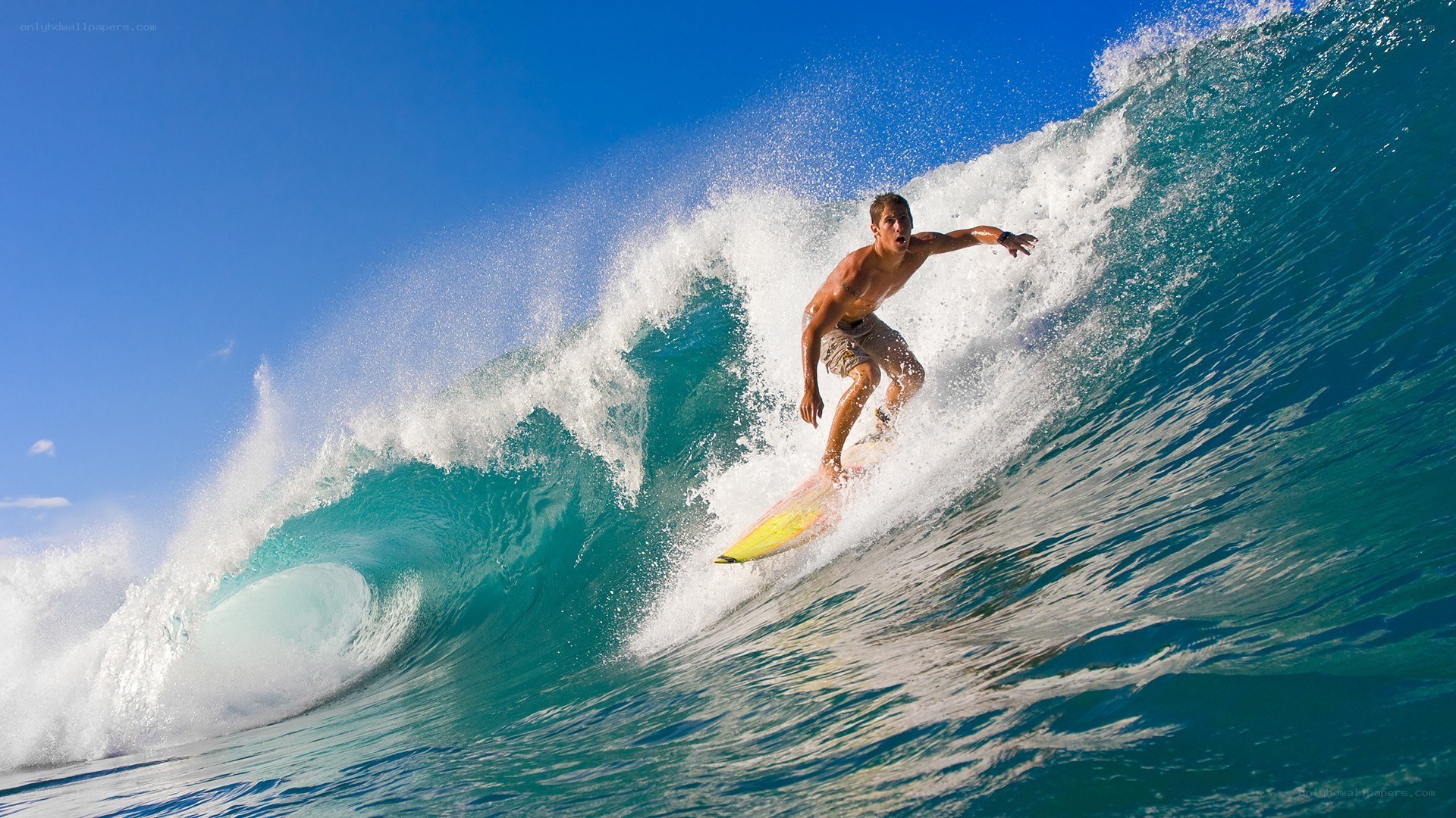 Surfer riding a large wave