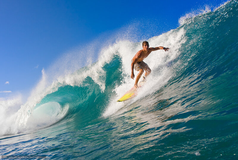 Surfer riding a large wave