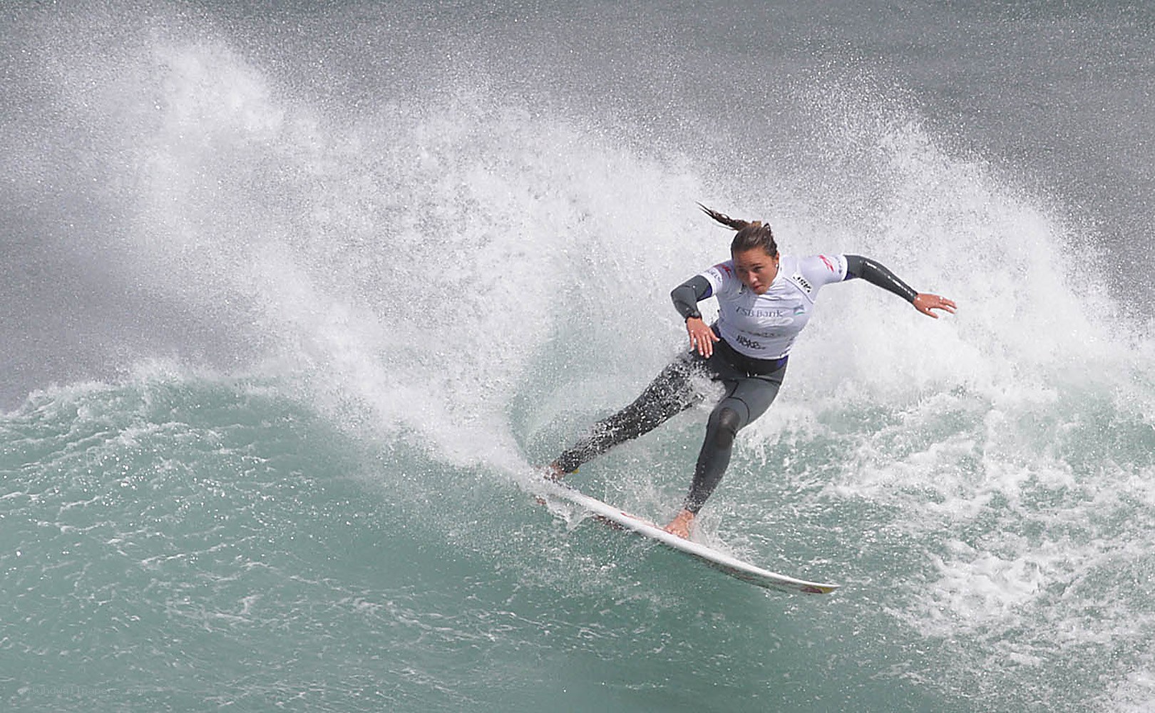Surfer riding a wave