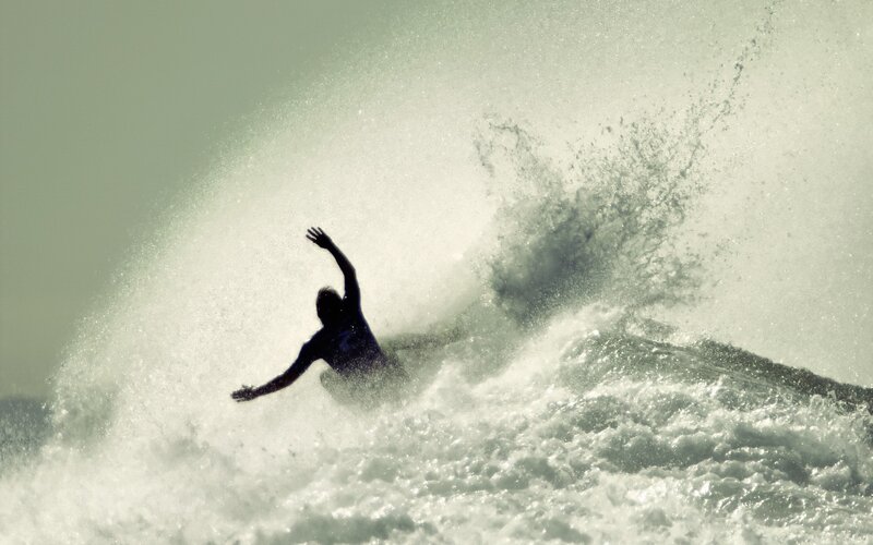 Surfer riding a wave