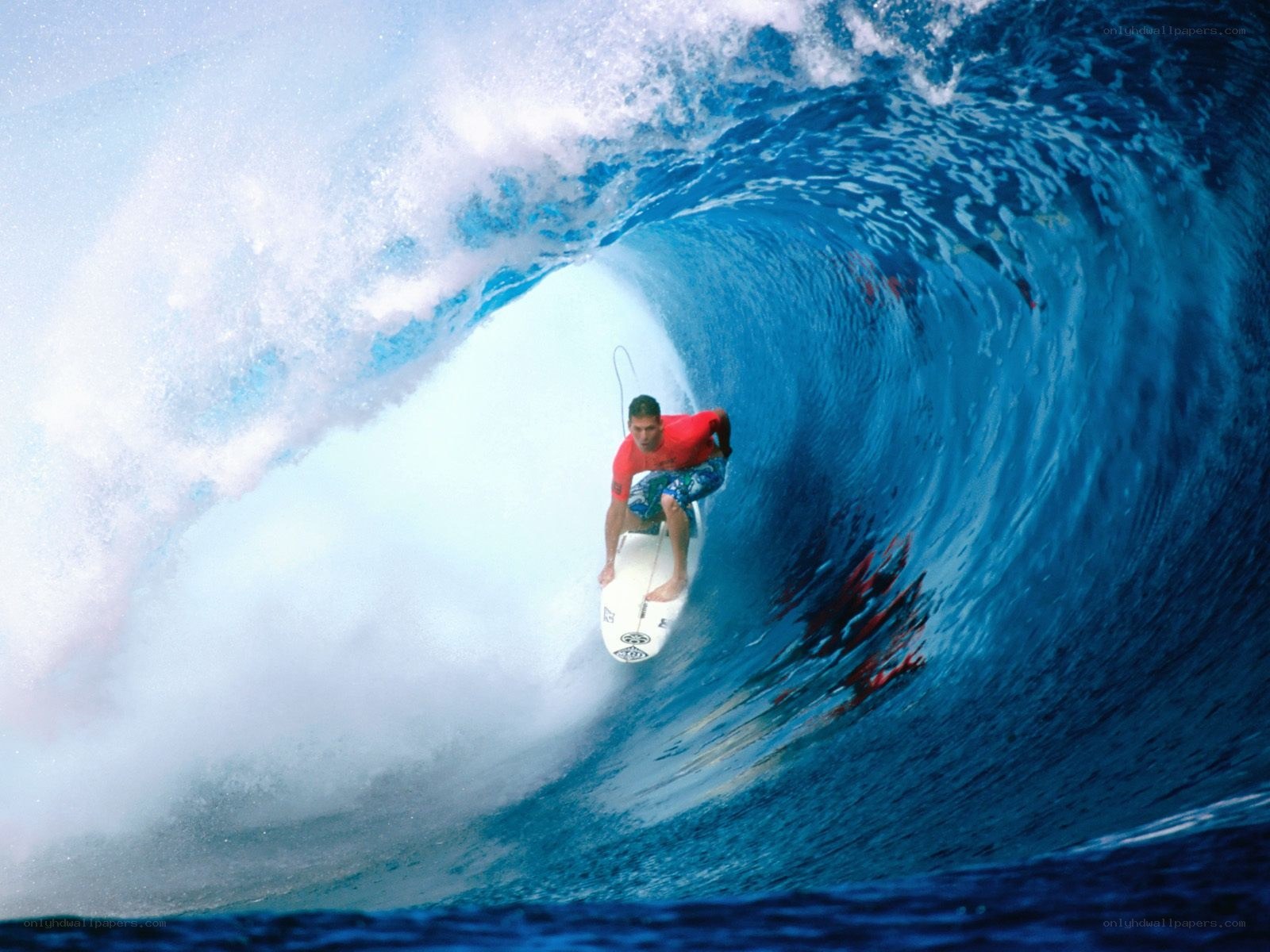 Surfer riding a wave tunnel