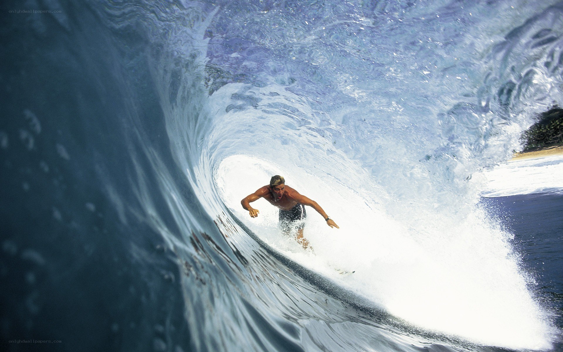 Surfer riding inside a wave