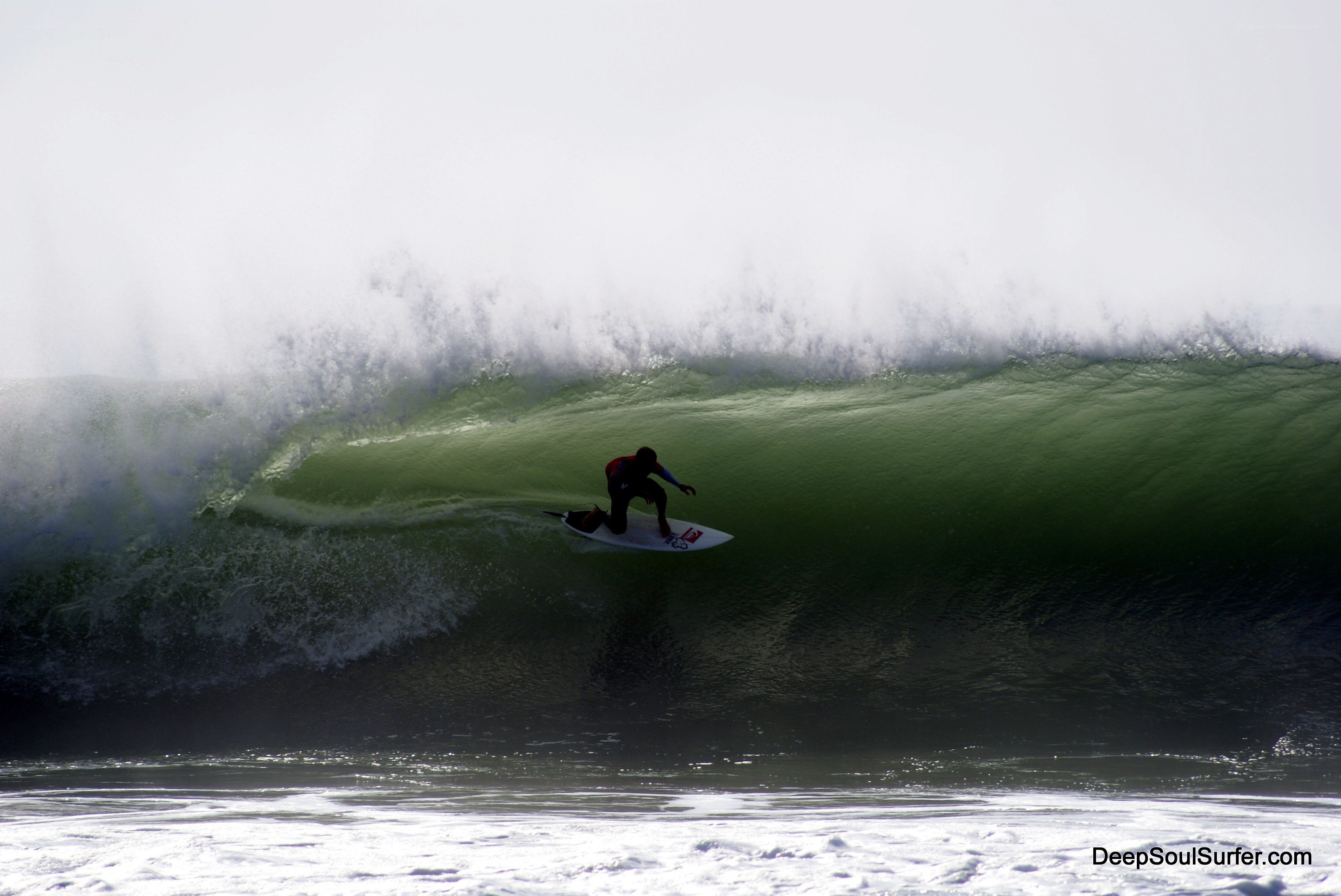 surfer riding large wave