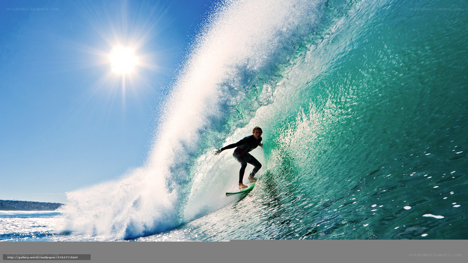 Surfer riding large wave