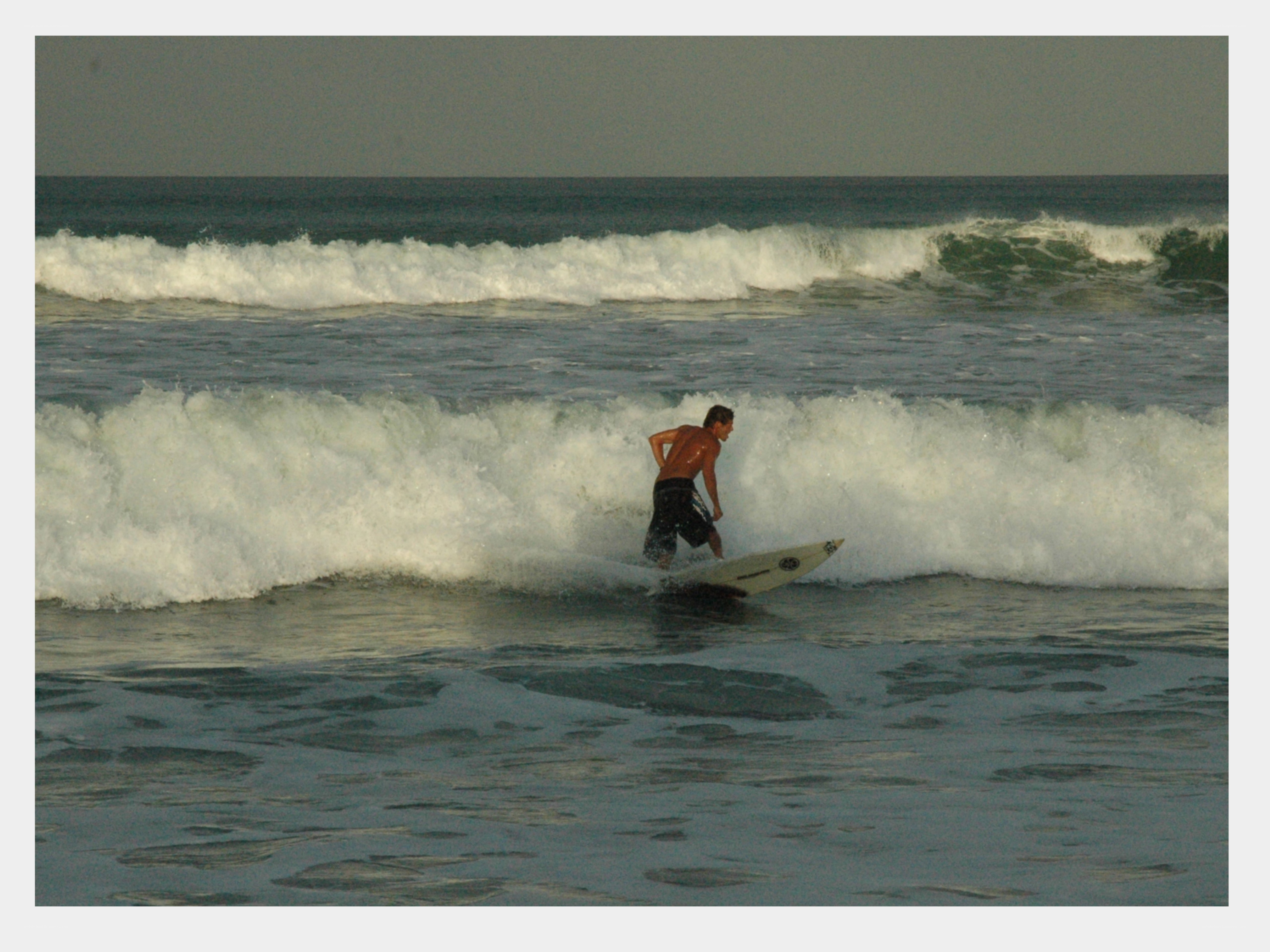 surfer riding ocean wave
