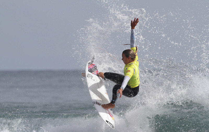 Surfer riding wave