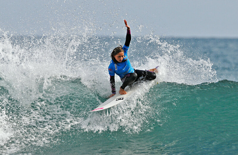 Surfer riding wave