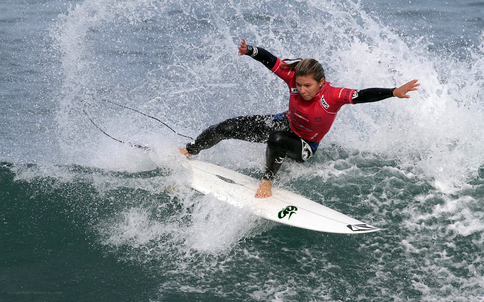 Surfer riding wave
