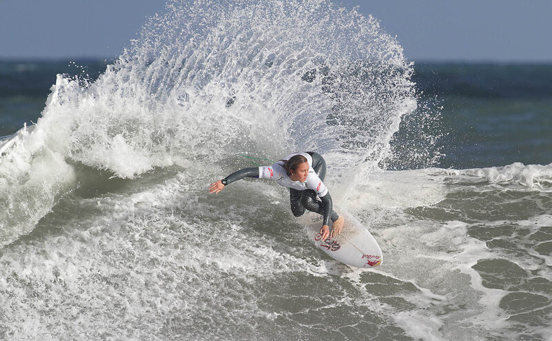 Surfer riding wave