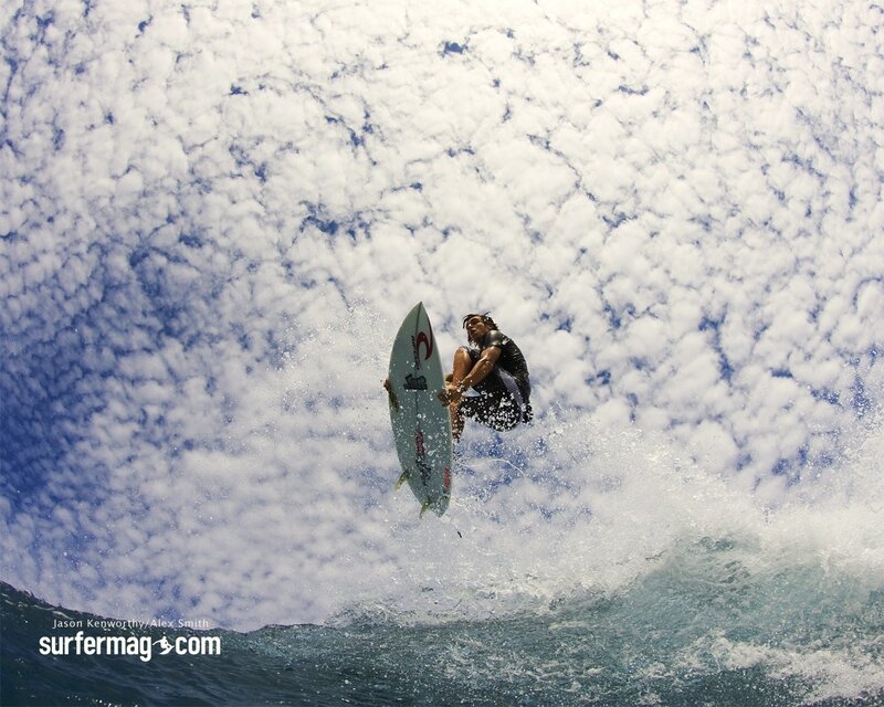 Surfer riding wave
