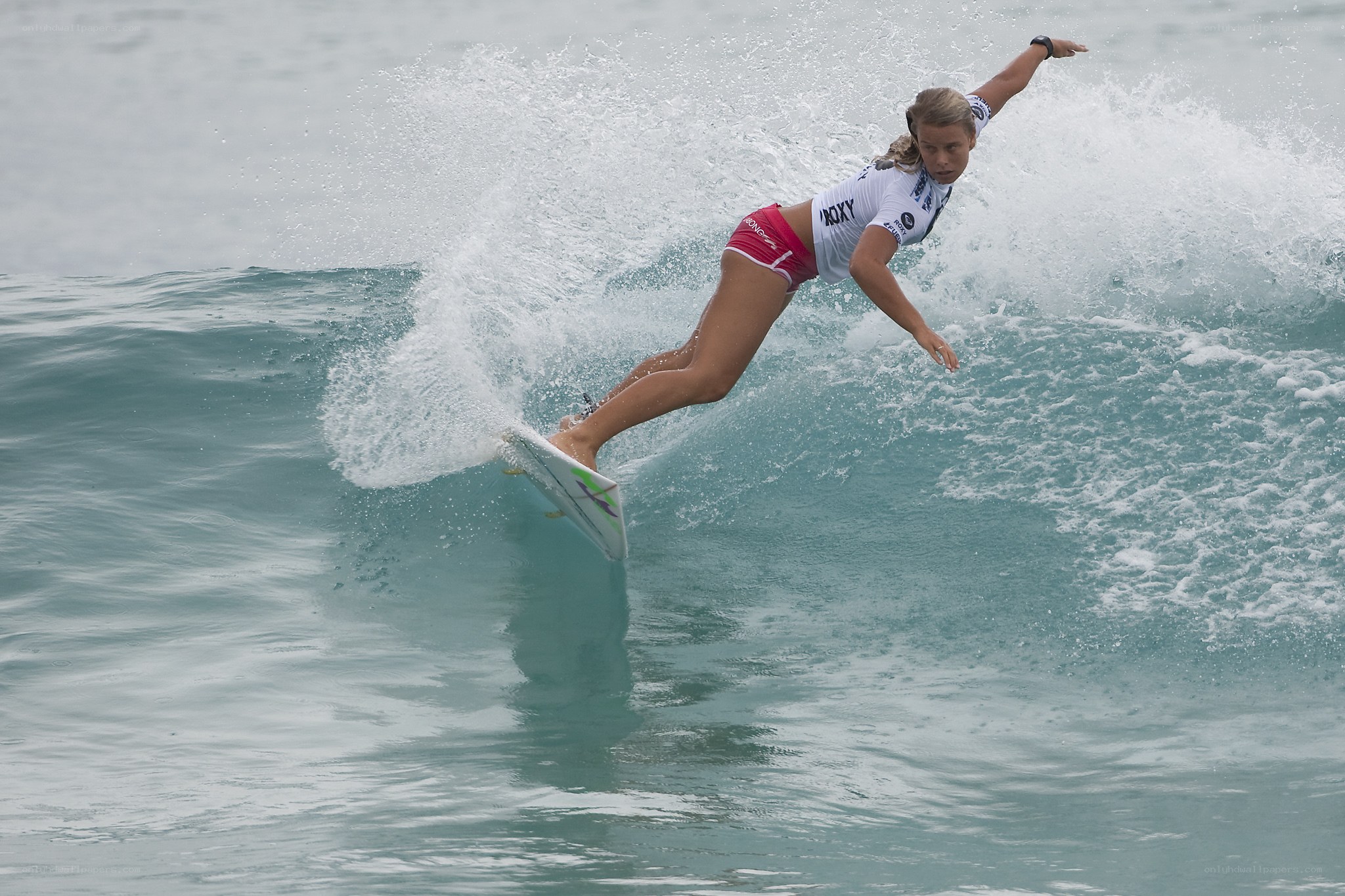 Surfer riding wave