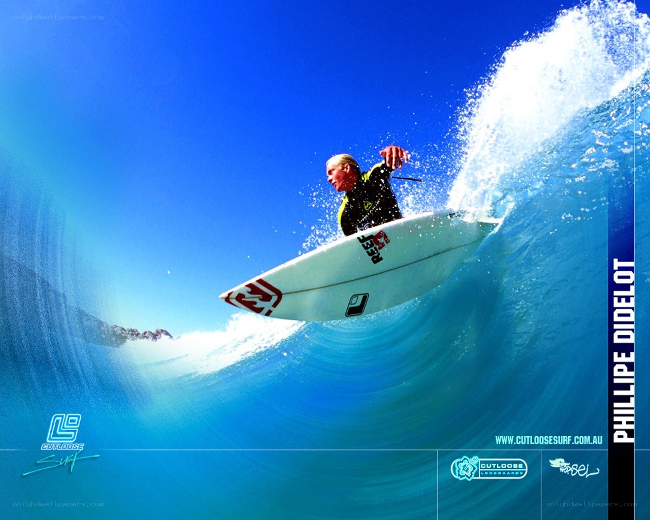 Surfer riding wave