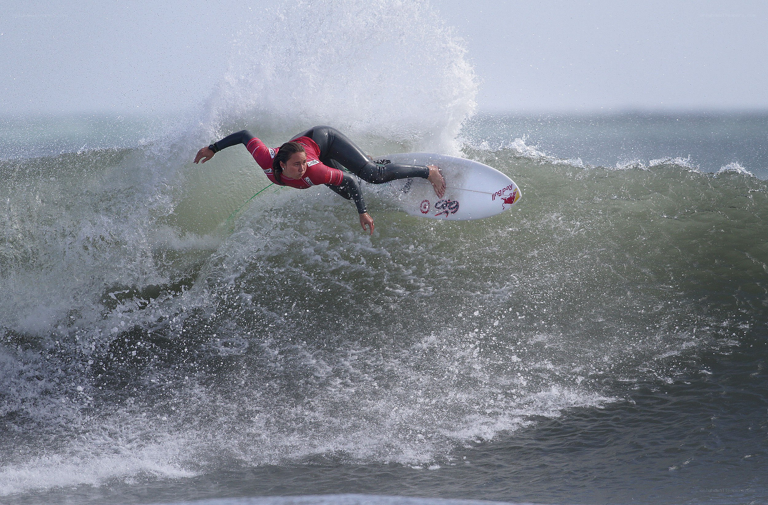 Surfer riding wave