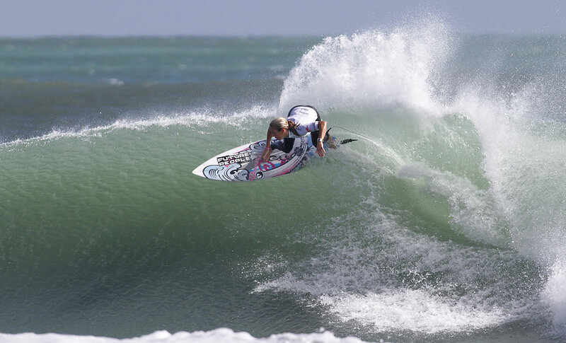 Surfer riding wave