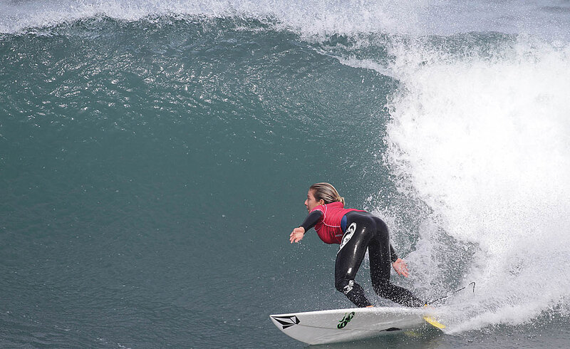 Surfer riding wave
