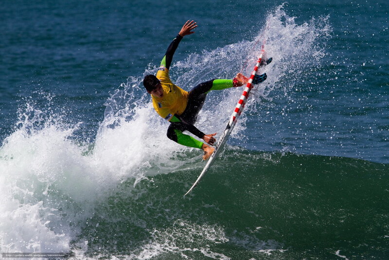 Surfer riding wave mid-air