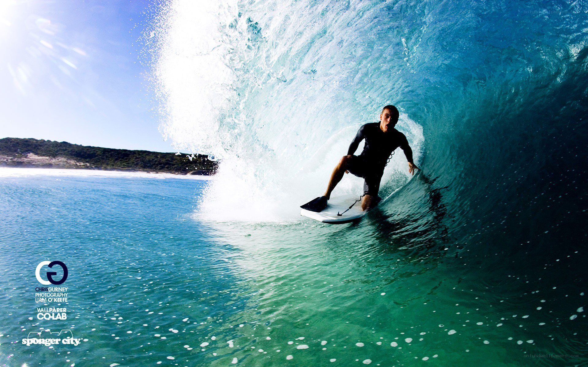 surfer riding wave tunnel
