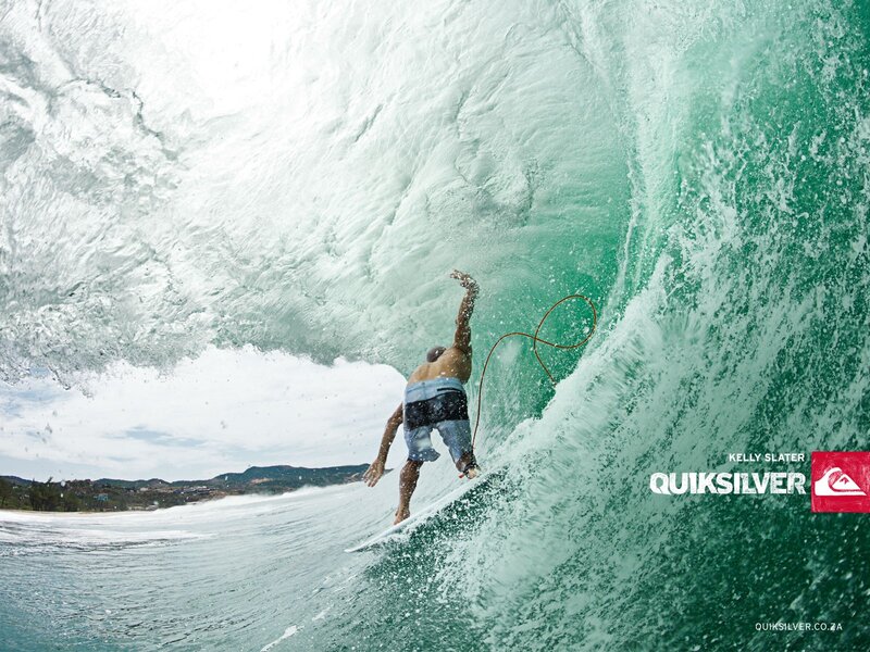 Surfer riding wave tunnel