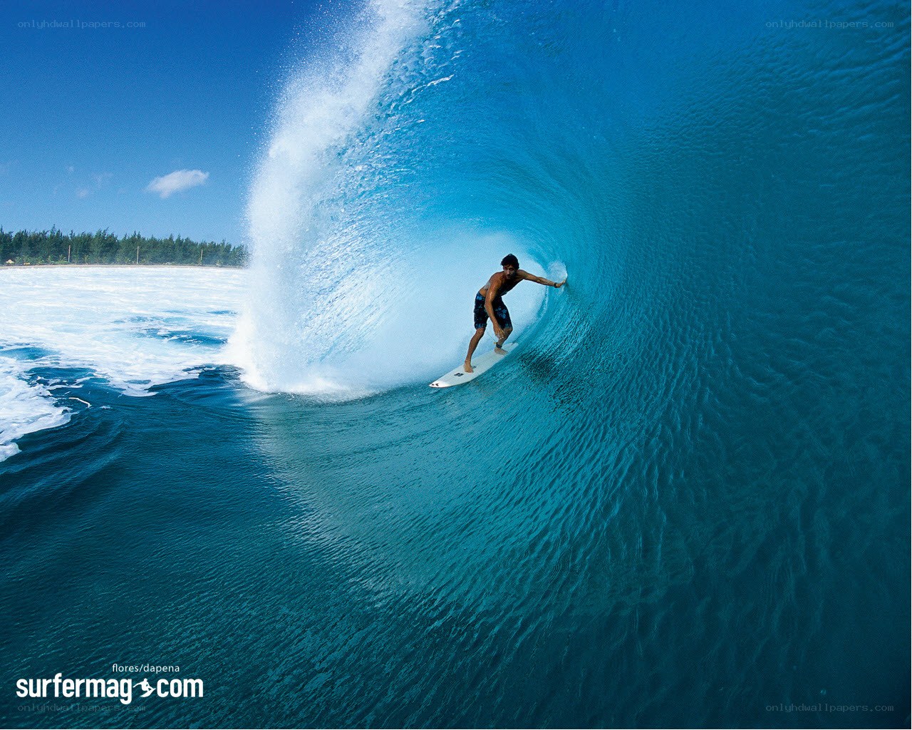 Surfer riding wave tunnel