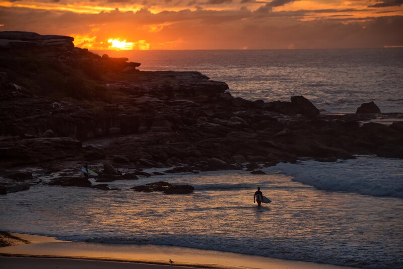 Surfer Walking into Ocean