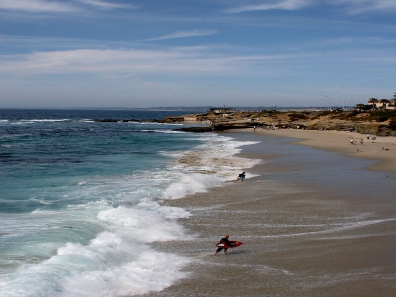 Surfers at Beach — Blue, Serene
