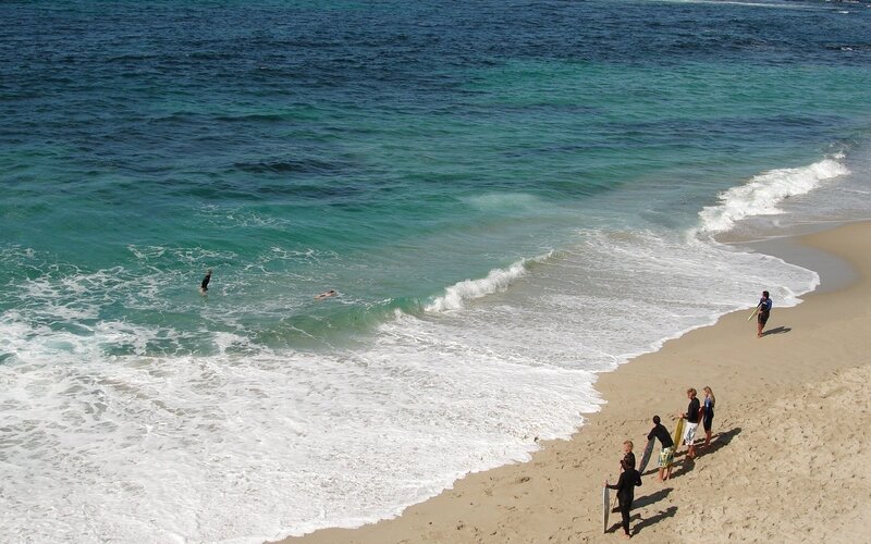 Surfers at Beach — Blue