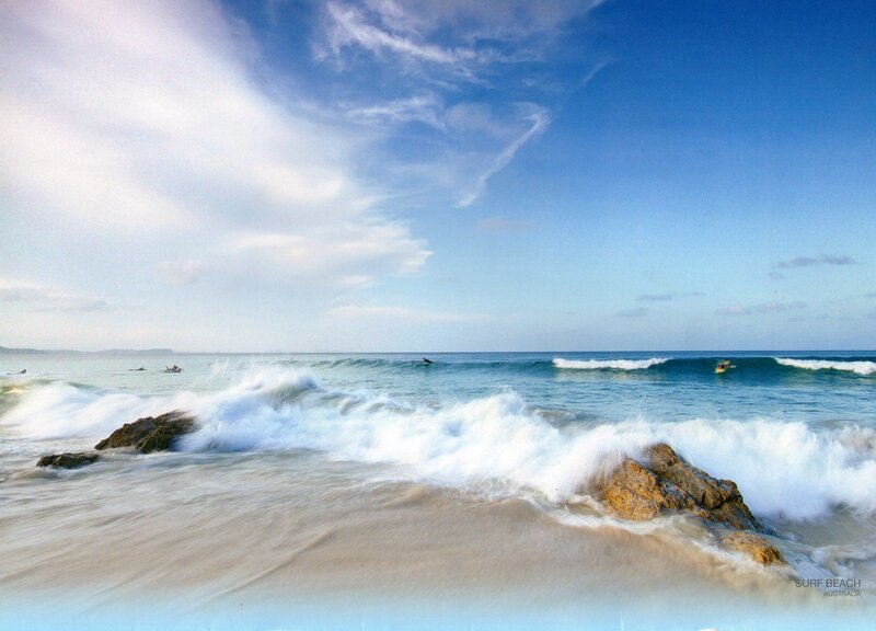 Surfers at Ocean Waves
