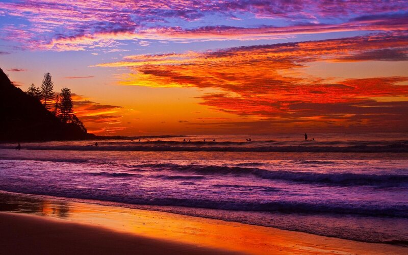 Surfers at Sunset — Orange, Dramatic, Photograph