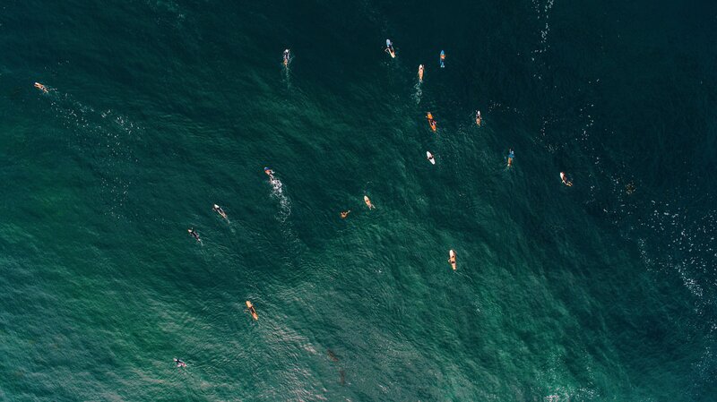 Surfers in Ocean — Blue, Serene