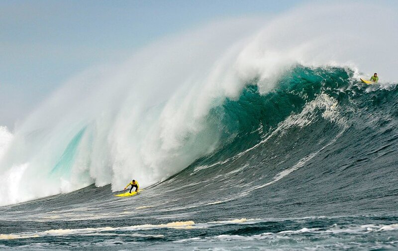 Surfers on Large Wave