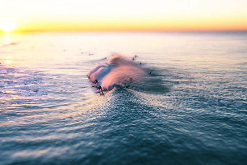 Surfers on Ocean Waves — Blue, Serene