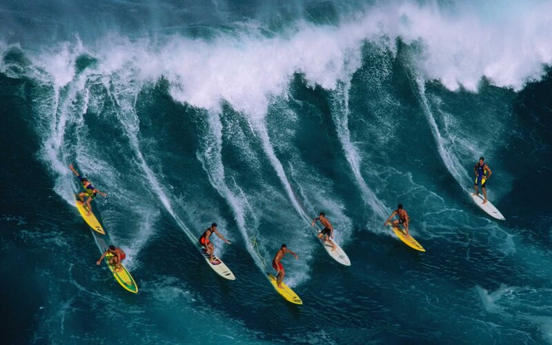 Surfers Riding Wave — Blue