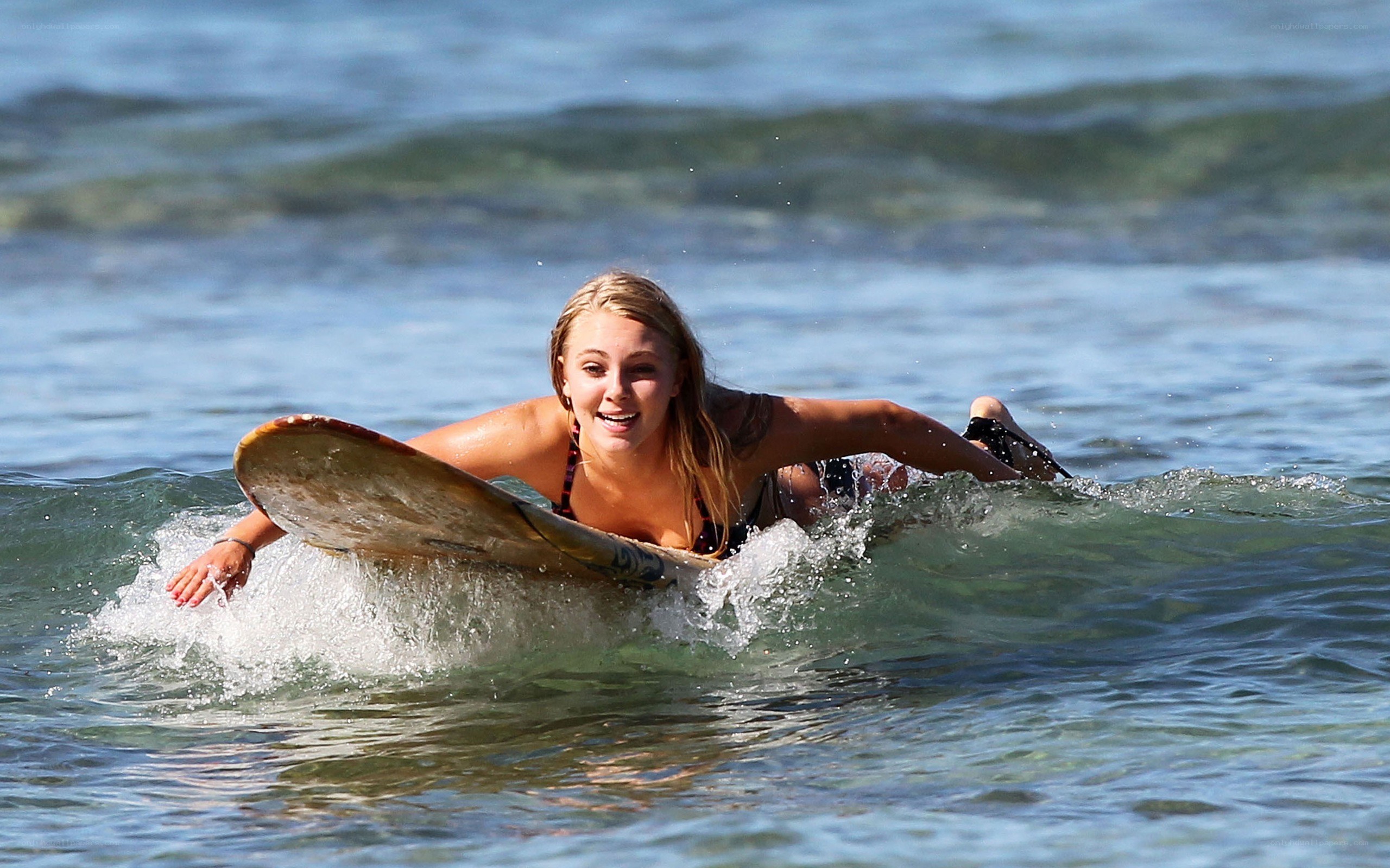 Surfing in the ocean
