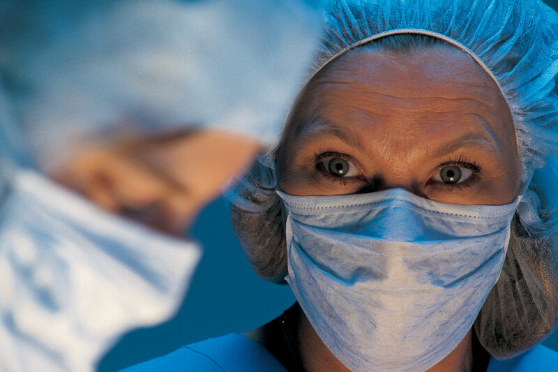 Surgeon in Operating Room — Blue