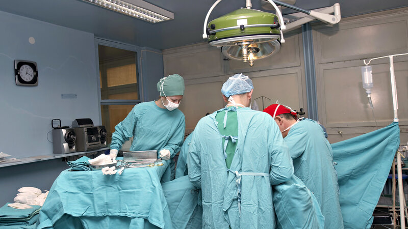 Surgeons in Operating Room — Blue