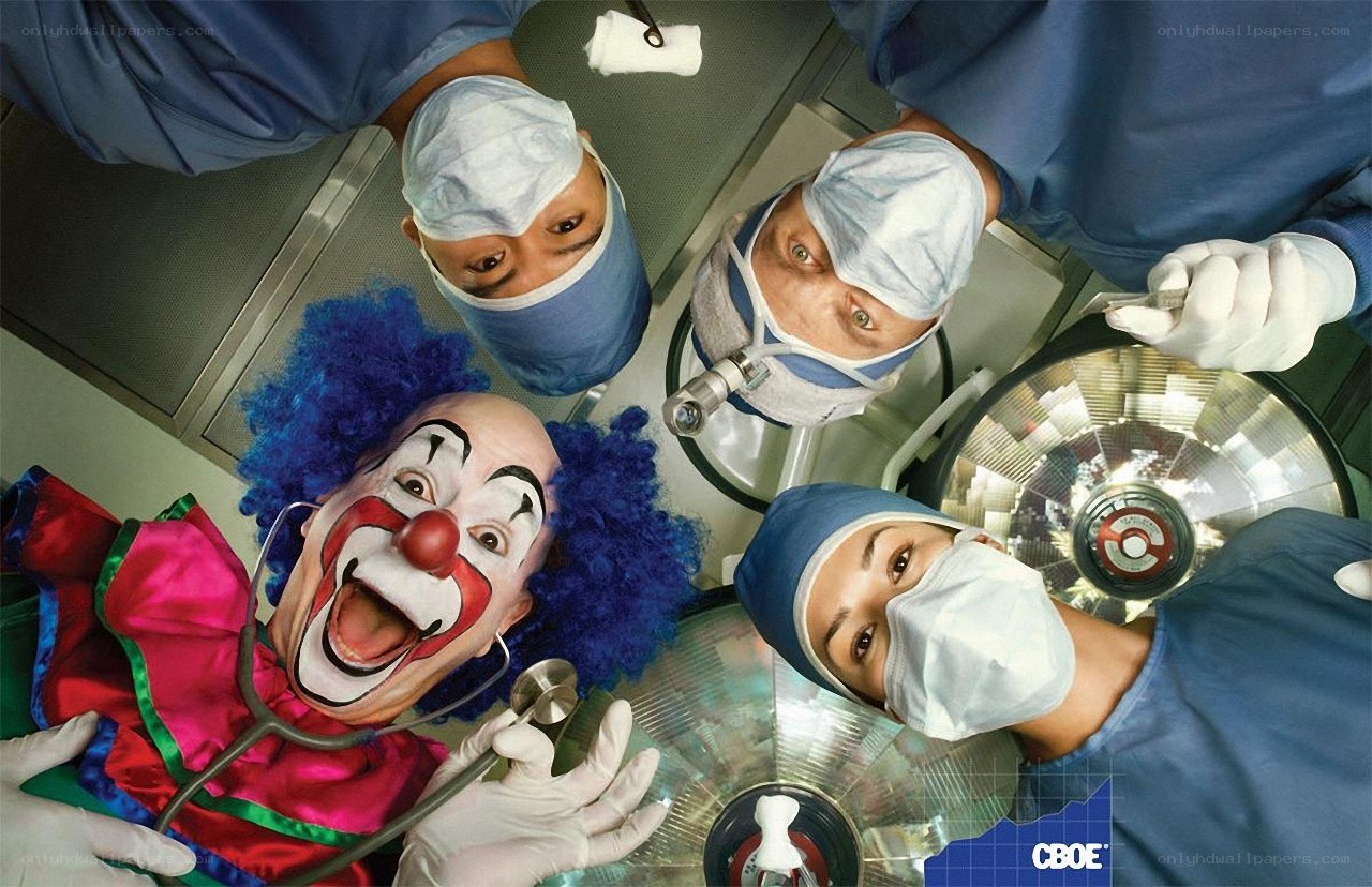 Surgeons with clown patient