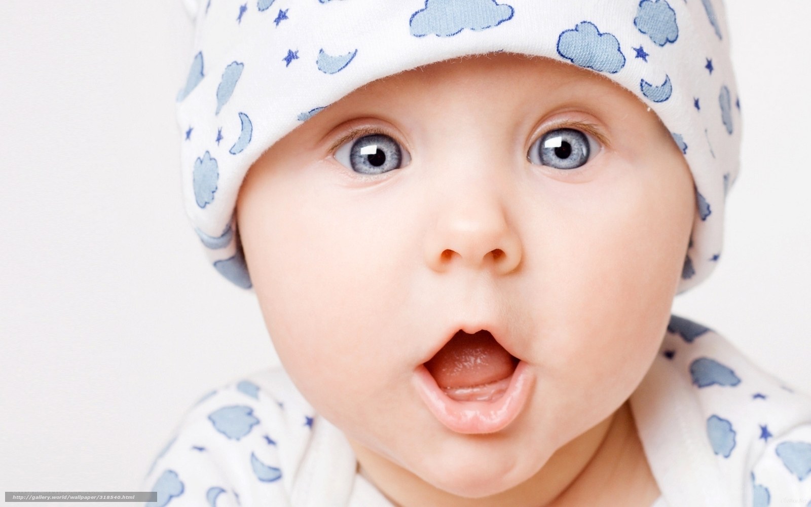 surprised baby in hat