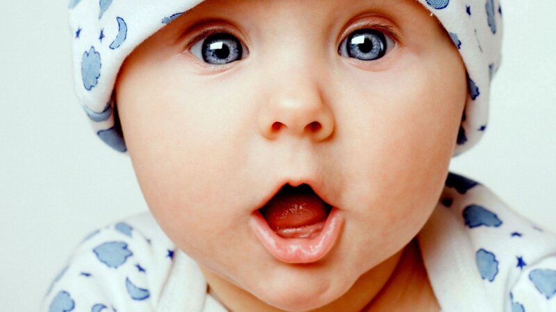 surprised baby with blue eyes