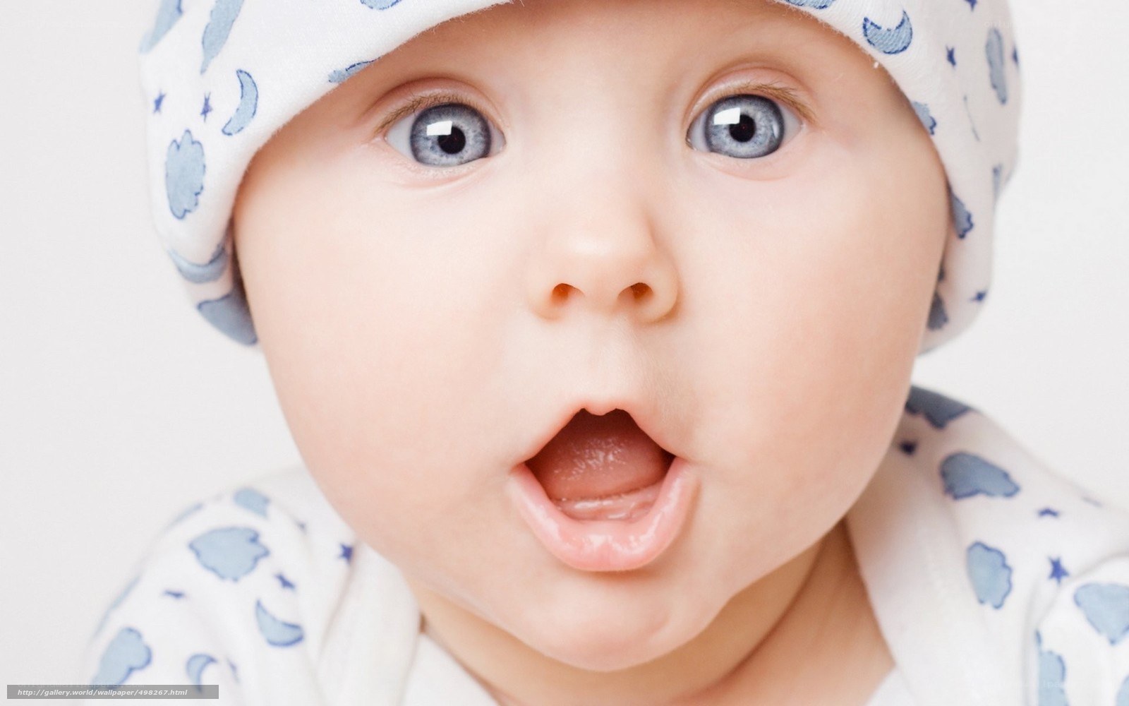surprised baby with blue eyes