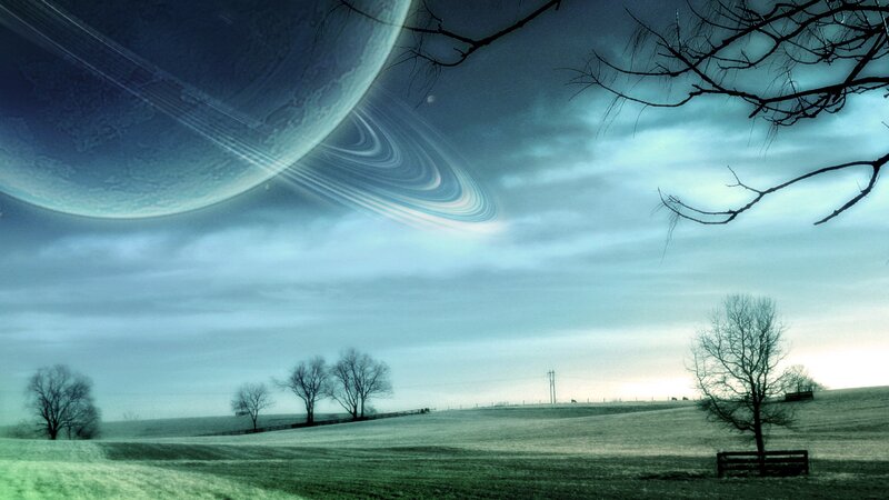 Surreal alien landscape with rings