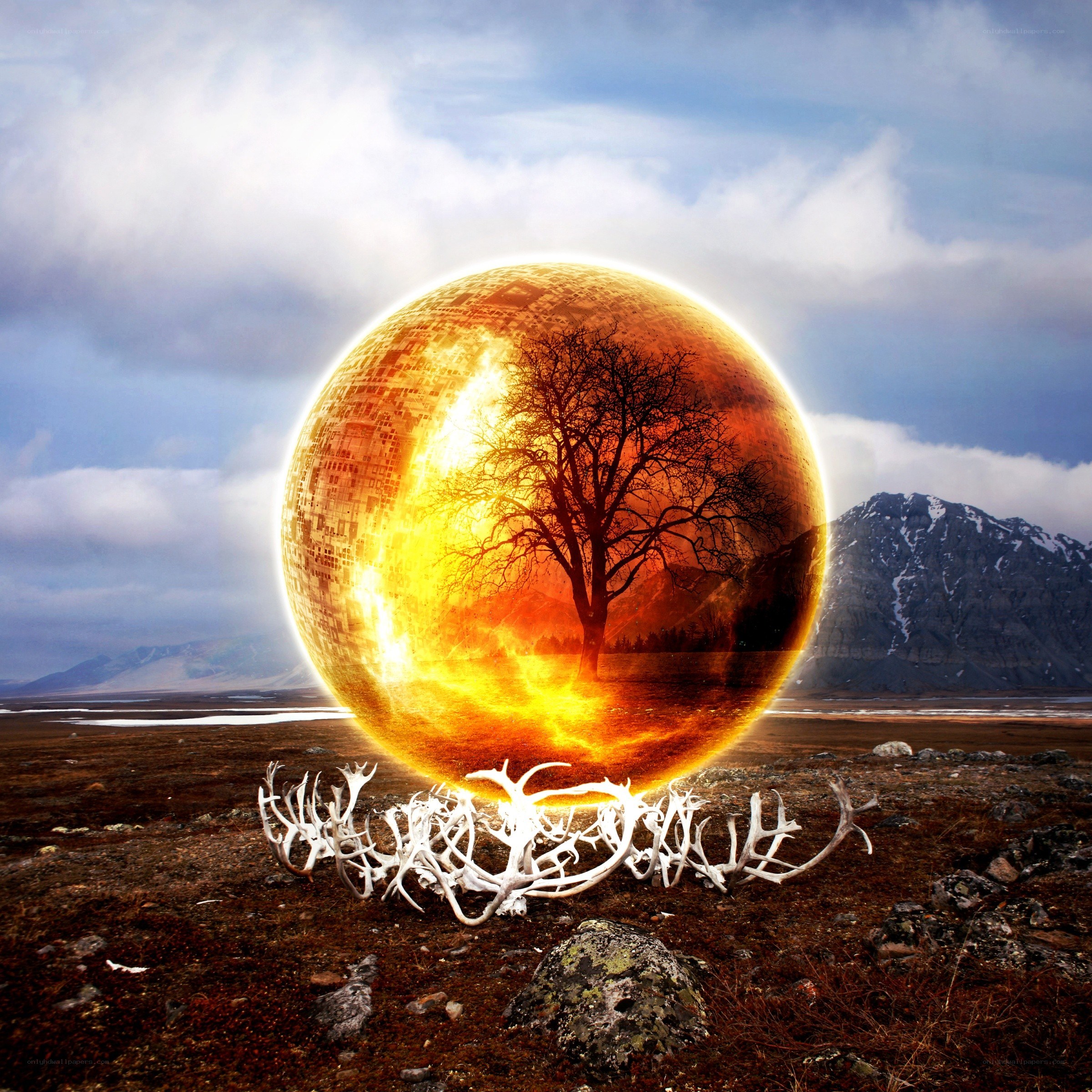 Surreal glowing sphere in landscape