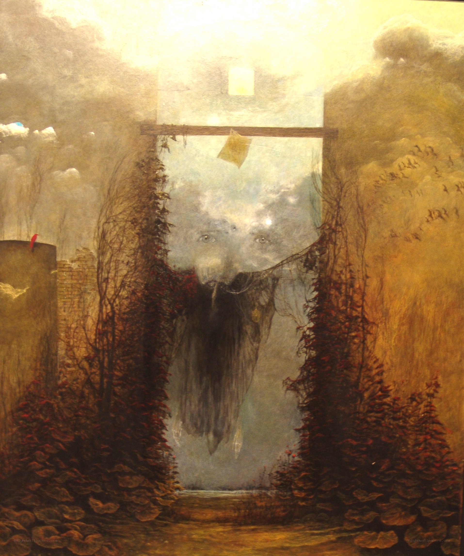 Surreal landscape with floating face