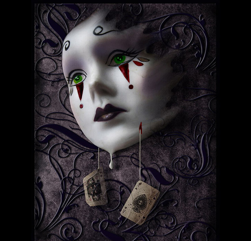 surreal mask with playing cards