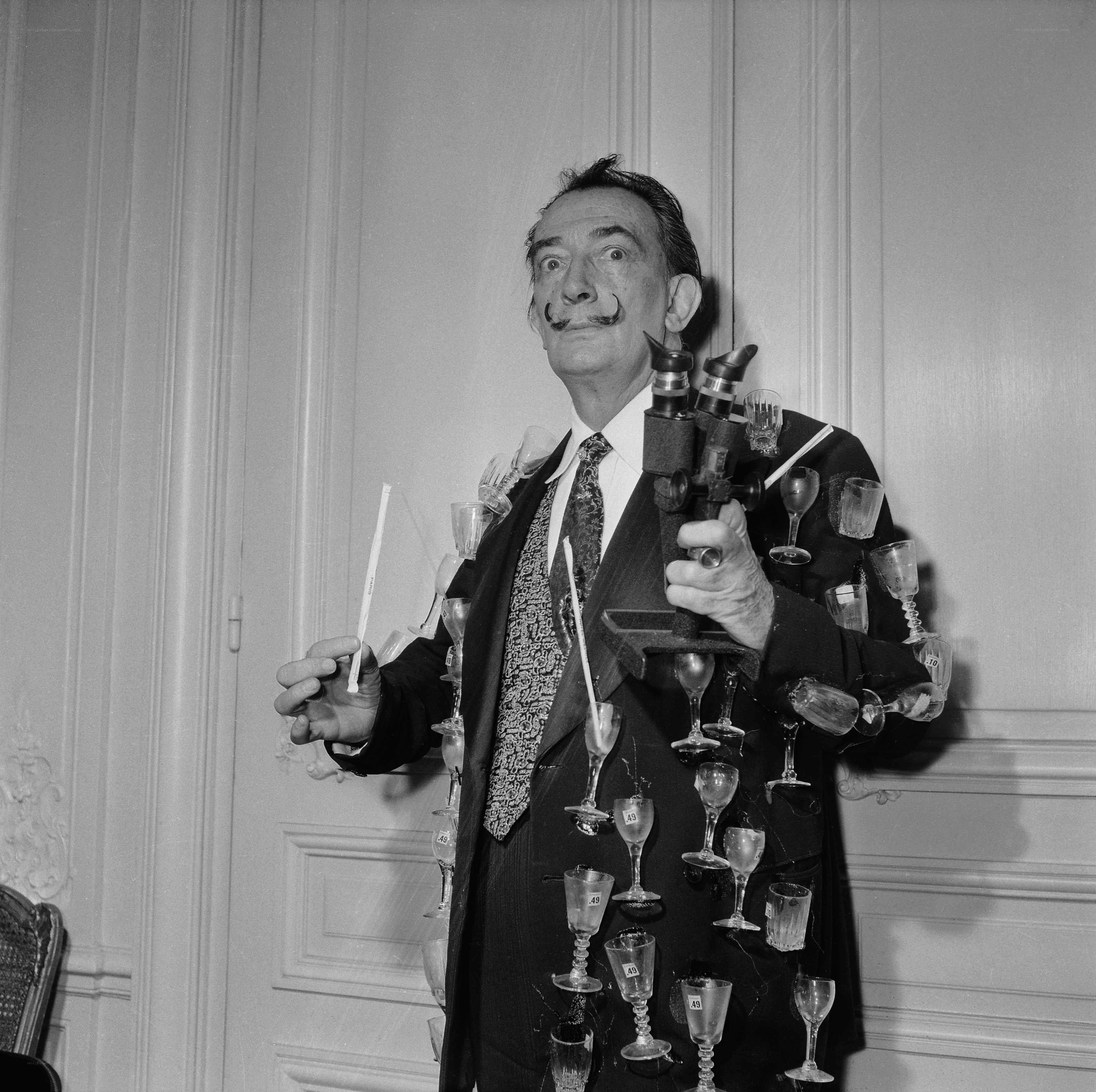 Surrealist artist with glasses