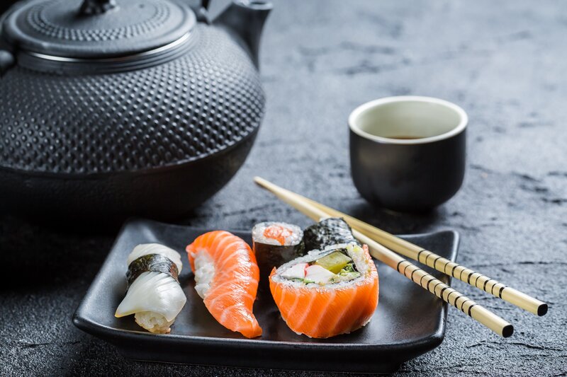 Sushi on Black Plate — Calm