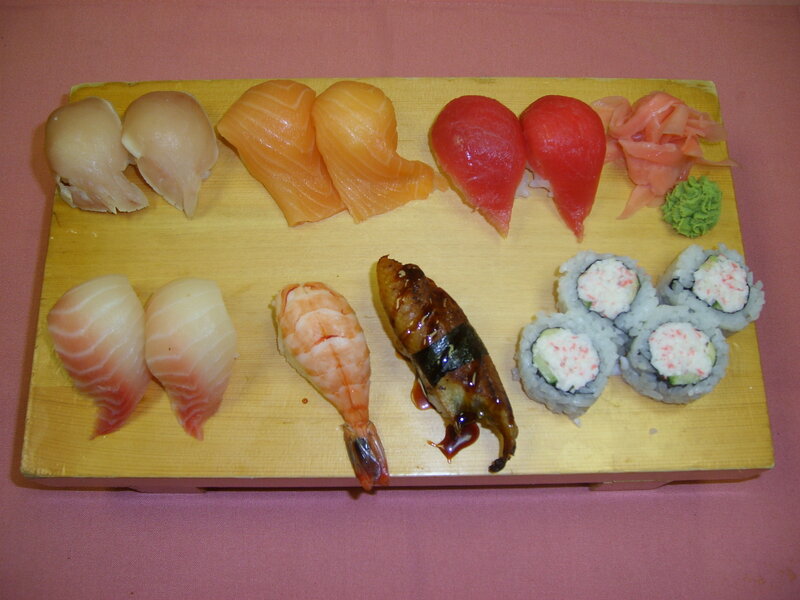 sushi platter on wooden board