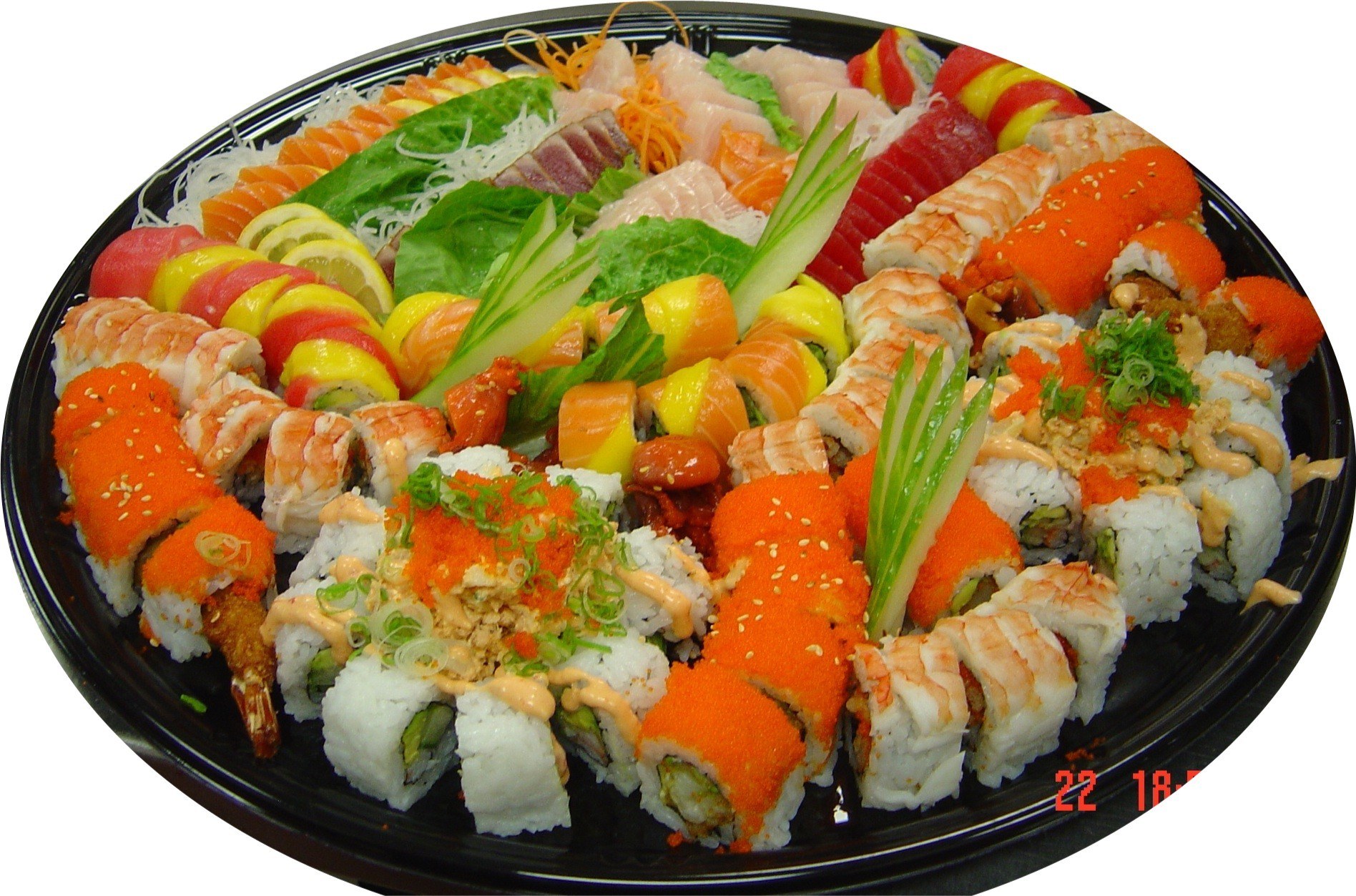 sushi platter with rolls and sashimi