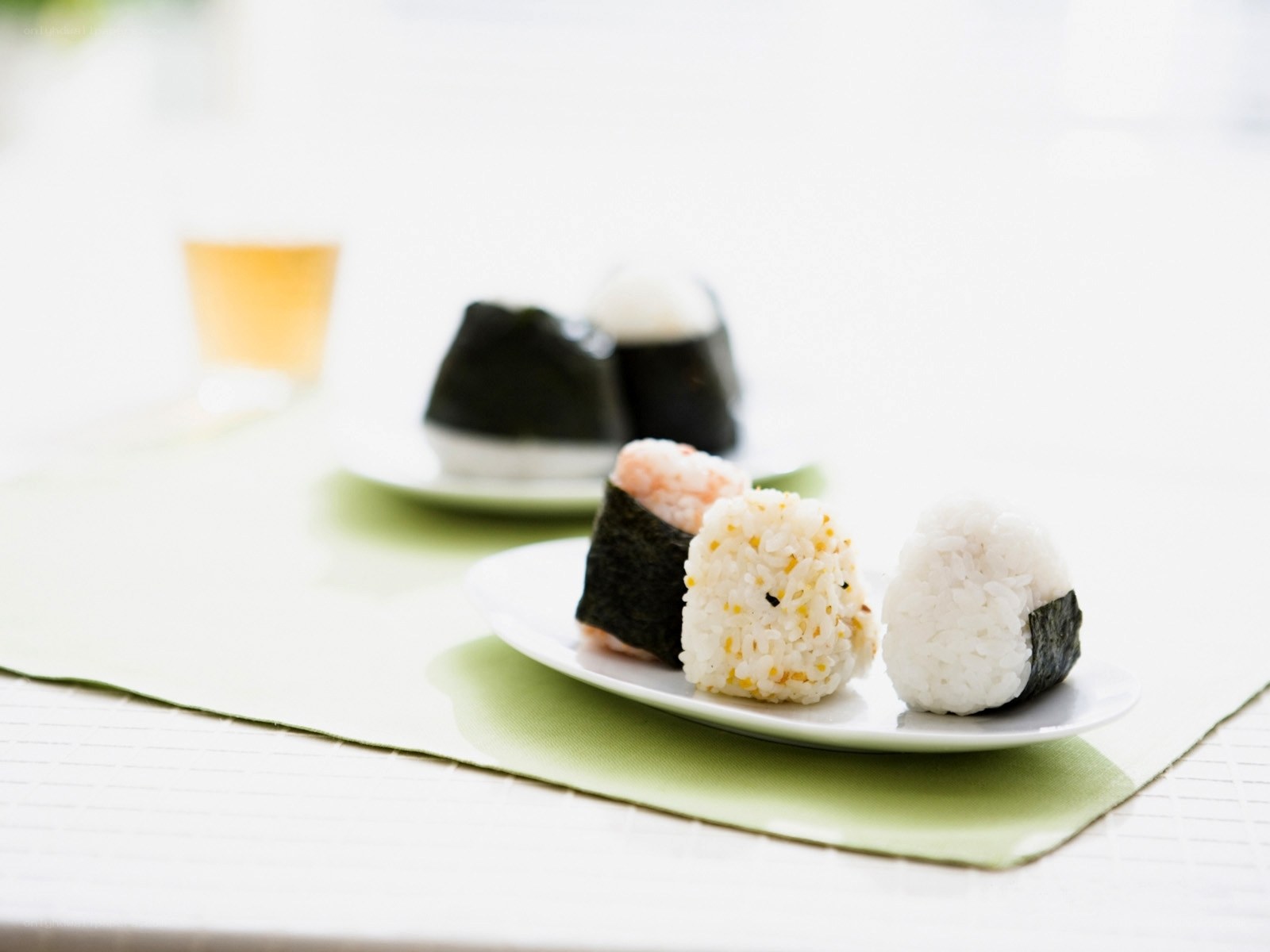 Sushi rice balls on plates